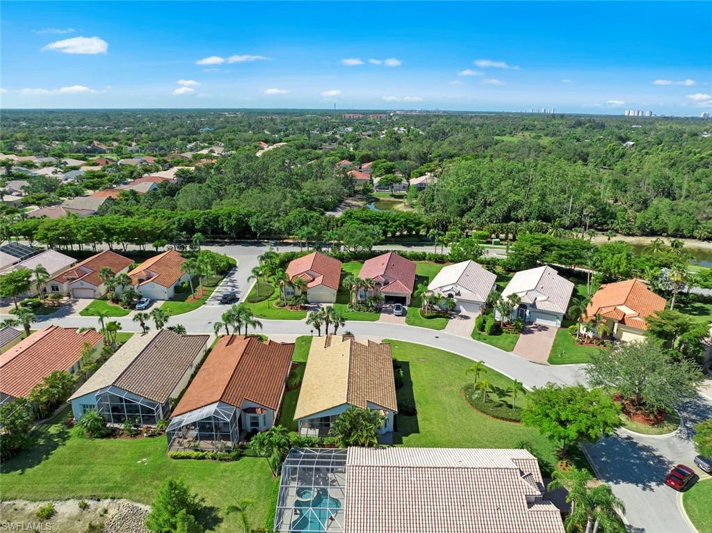 9097 Springview Loop Estero, FL 33928 - Photo 39 of 50 an aerial view of a house with yard swimming pool and outdoor seating