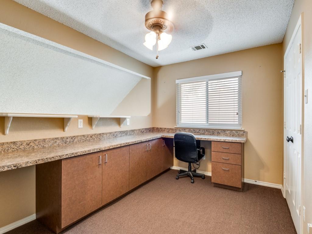 1317 Chestnut Drive Rowlett, TX 75089 - Photo 18 of 25 a bedroom with a large bed and furniture