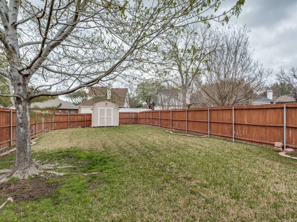 1317 Chestnut Drive Rowlett, TX 75089 - Photo 23 of 25 a view of backyard with wooden fence
