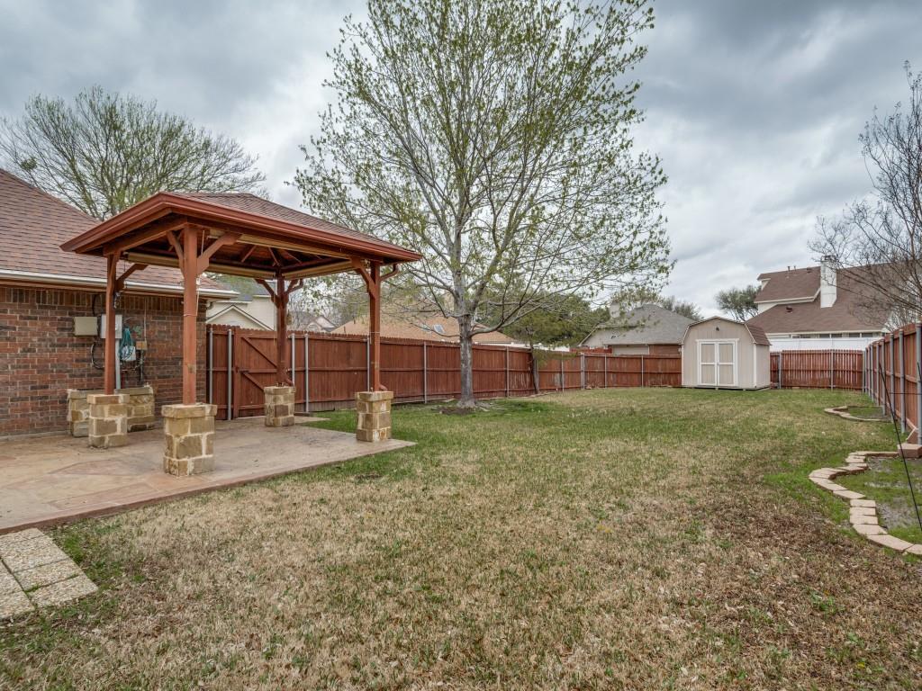 1317 Chestnut Drive Rowlett, TX 75089 - Photo 24 of 25 a view of a backyard with sitting area