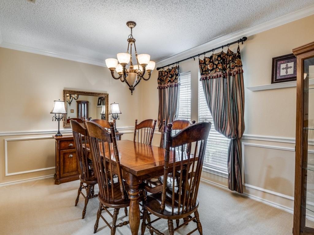 1317 Chestnut Drive Rowlett, TX 75089 - Photo 4 of 25 a view of a dining room with furniture window and wooden floor