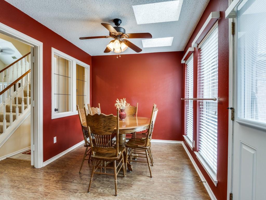 1317 Chestnut Drive Rowlett, TX 75089 - Photo 9 of 25 a view of a dining room with furniture window and wooden floor
