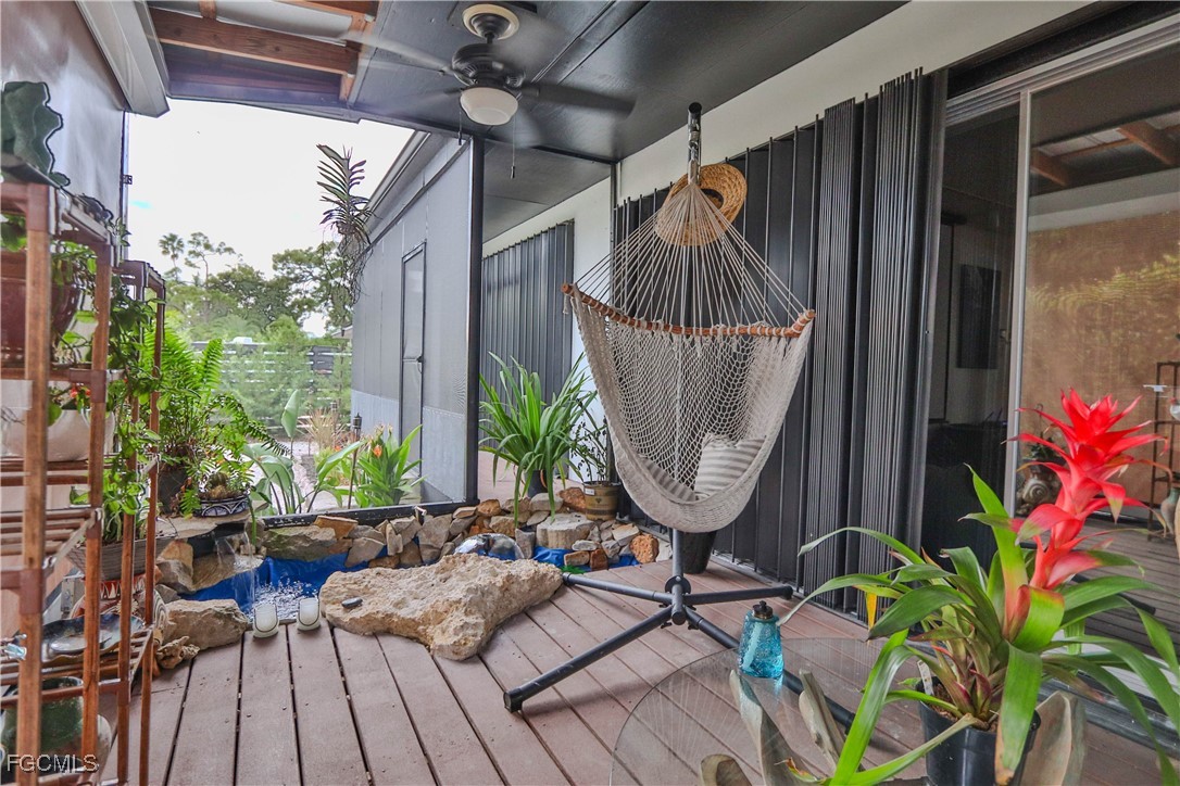 3666 Princeton Street Fort Myers, FL 33901 - Photo 14 of 38 a view of a balcony with chairs and a potted plant