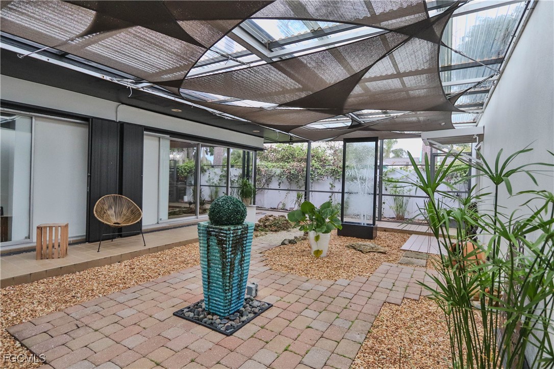 3666 Princeton Street Fort Myers, FL 33901 - Photo 34 of 38 a front view of a house with garden