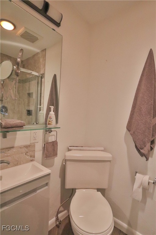 3666 Princeton Street Fort Myers, FL 33901 - Photo 37 of 38 a white toilet sitting next to a bathroom sink
