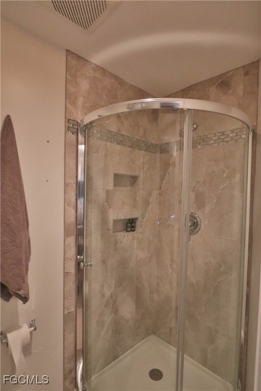 3666 Princeton Street Fort Myers, FL 33901 - Photo 38 of 38 a bathroom with a glass shower door