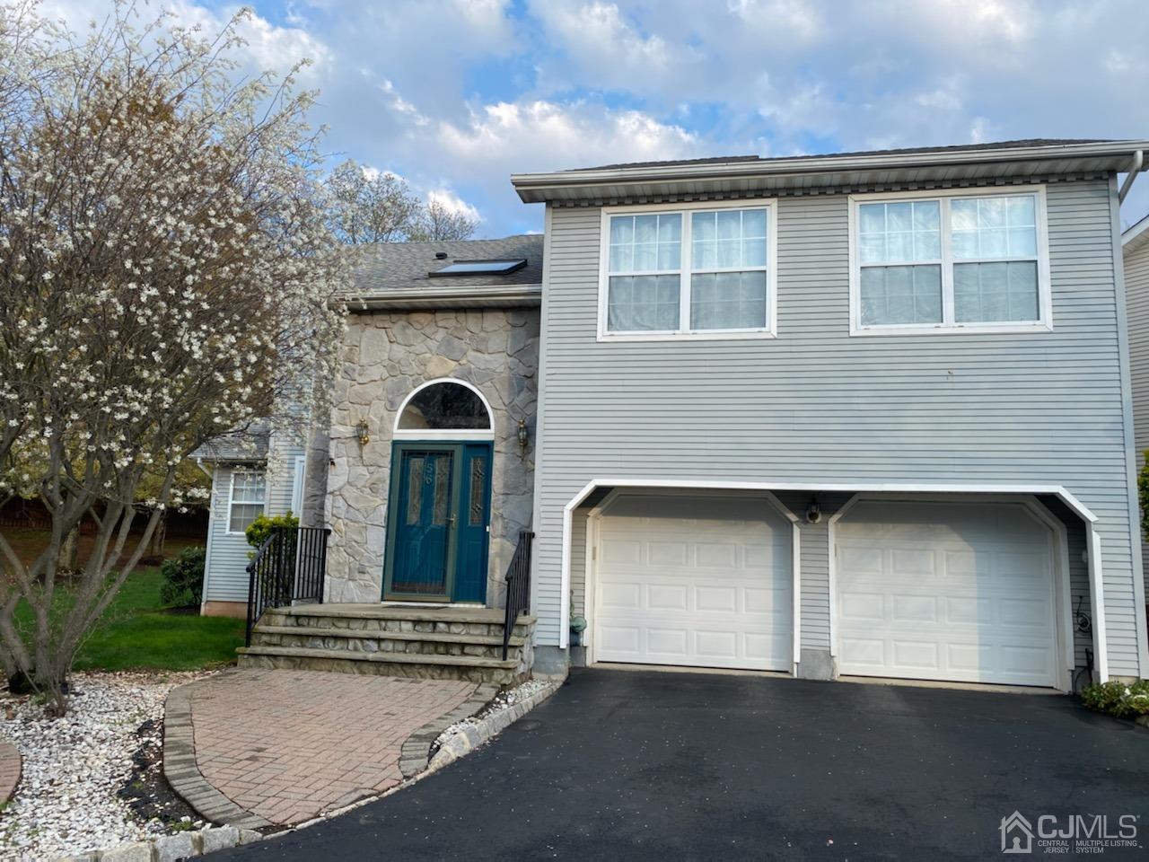 56 Whitehead Road Bridgewater, NJ 08807 - Photo 1 of 42 a front view of a house with yard