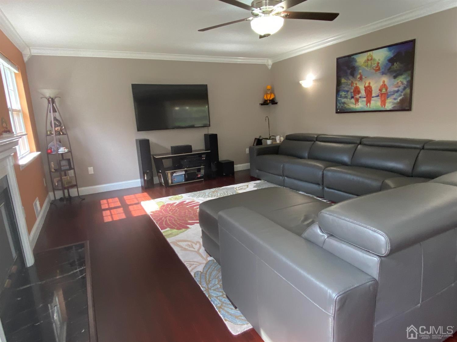 56 Whitehead Road Bridgewater, NJ 08807 - Photo 12 of 42 a living room with furniture and a flat screen tv