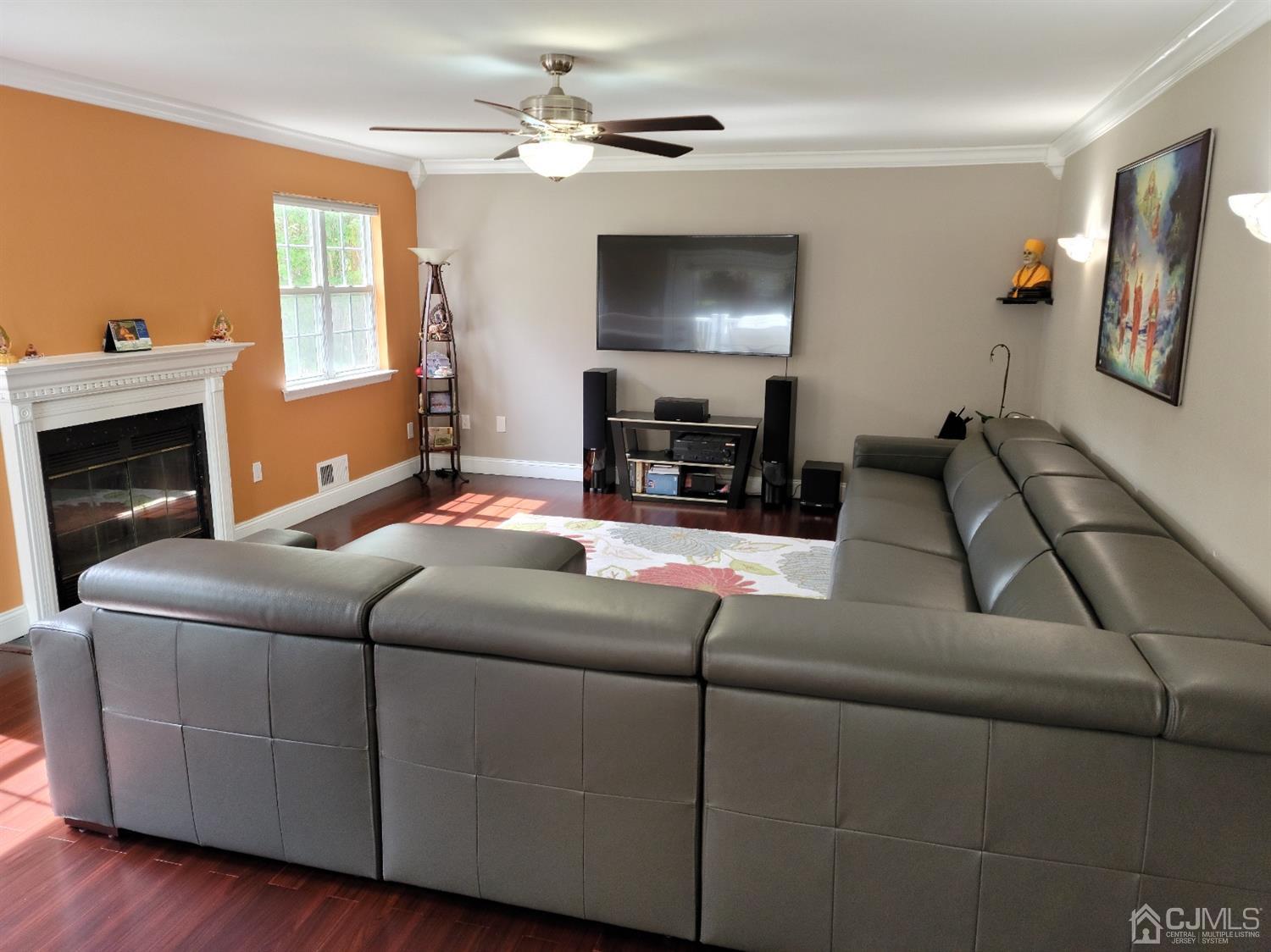 56 Whitehead Road Bridgewater, NJ 08807 - Photo 15 of 42 a living room with furniture and a fireplace