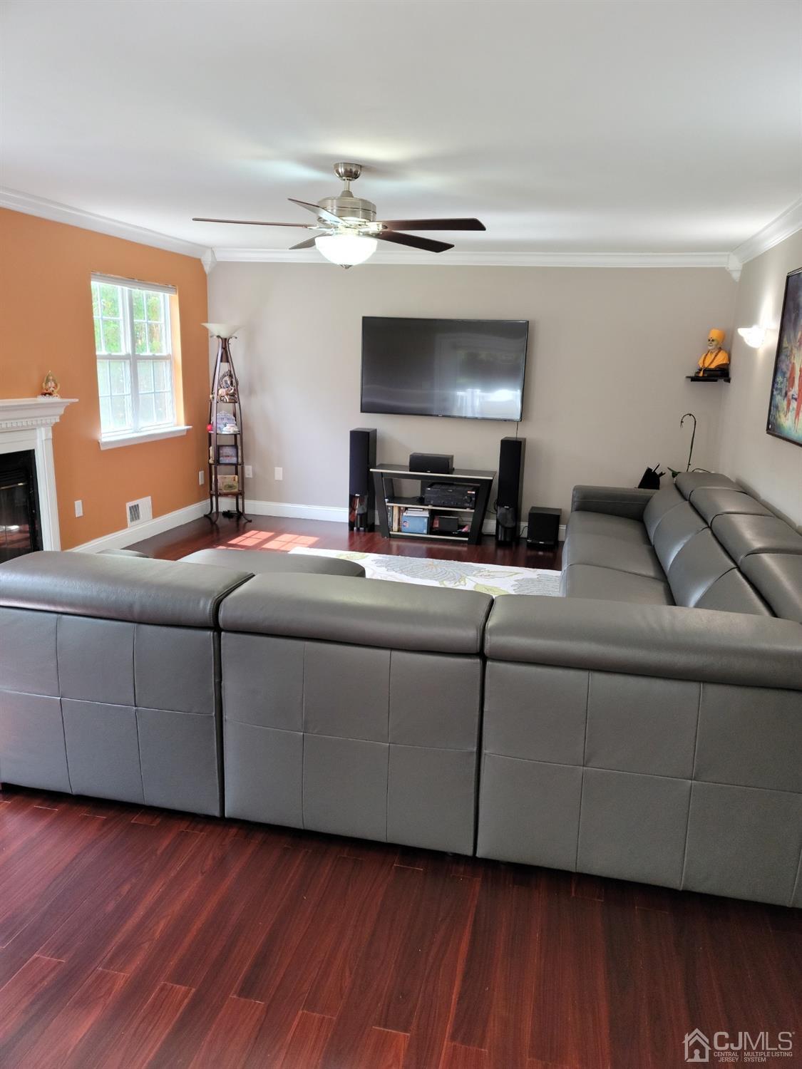 56 Whitehead Road Bridgewater, NJ 08807 - Photo 16 of 42 a living room with furniture and a flat screen tv
