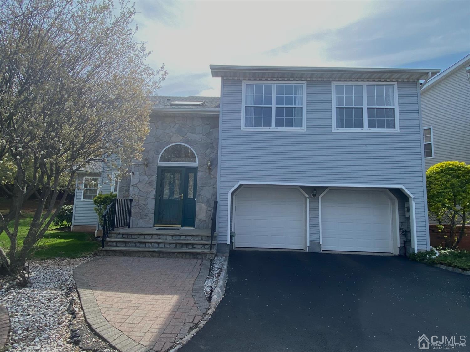56 Whitehead Road Bridgewater, NJ 08807 - Photo 3 of 42 a front view of a house with balcony