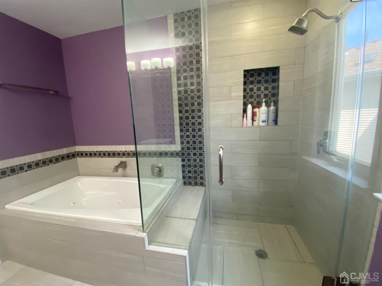 56 Whitehead Road Bridgewater, NJ 08807 - Photo 21 of 42 a bathroom with a bathtub and shower