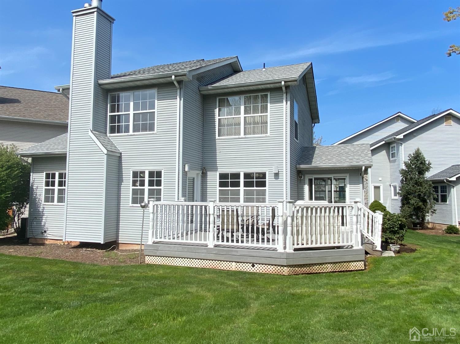 56 Whitehead Road Bridgewater, NJ 08807 - Photo 33 of 42 a view of a house with a yard and deck
