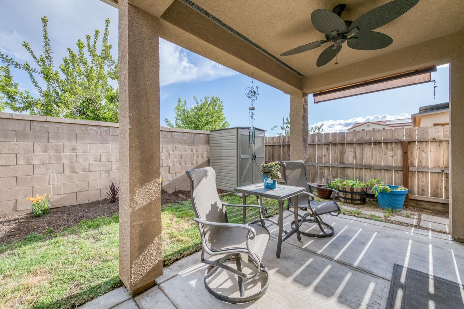 3610 Griffith Avenue Clovis, CA 93619 - Photo 20 of 22 a patio with patio outdoor seating and yard