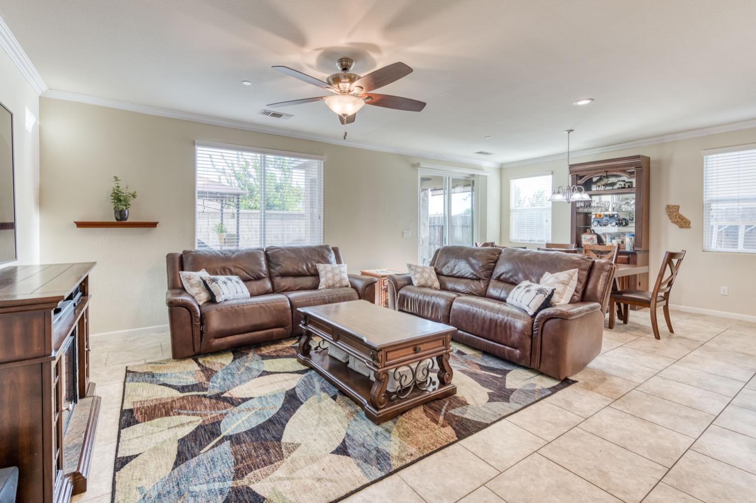 3610 Griffith Avenue Clovis, CA 93619 - Photo 5 of 22 a living room with furniture and a large window