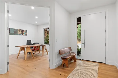 a workspace with furniture and a window