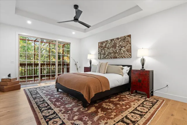 a bedroom with a large bed and a window