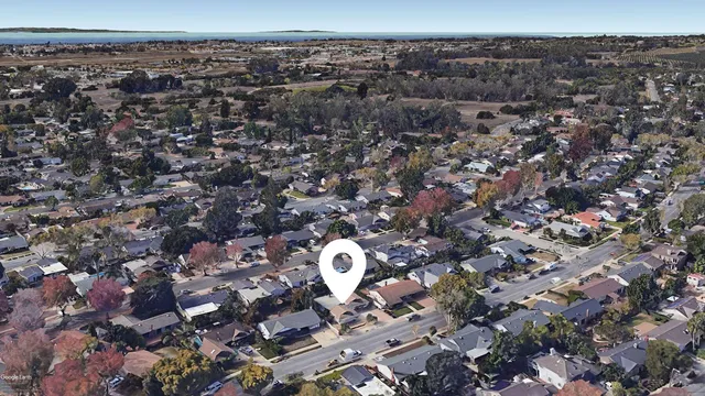 an aerial view of a house with a outdoor space