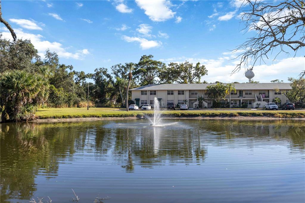 4885 Rilma Avenue, Unit 131 Sarasota, FL 34234 - Photo 23 of 25 a view of residential houses with lake view