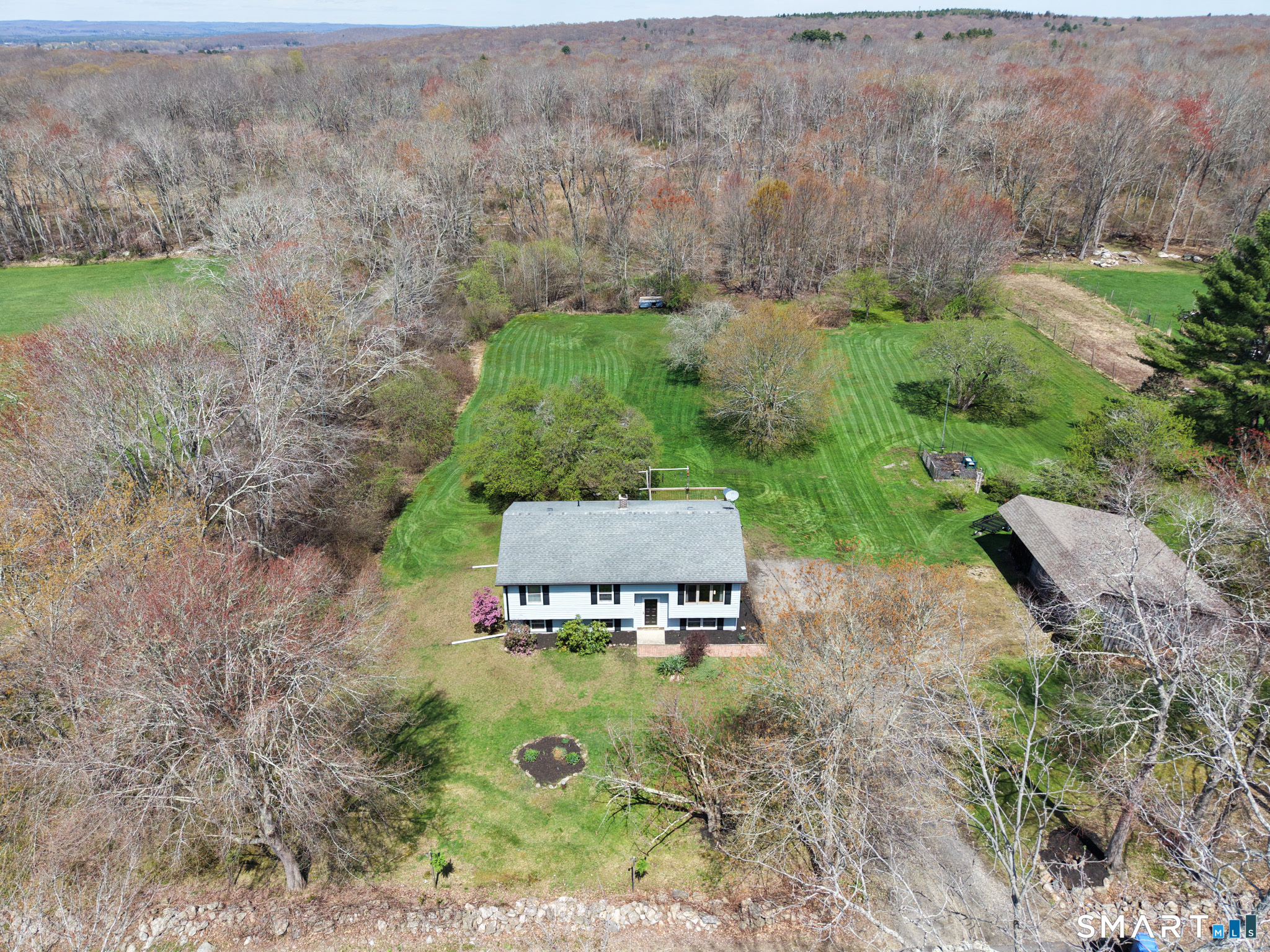 490 Kate Downing Road Plainfield, CT 06374 - Photo 1 of 1 an aerial view of a house with yard