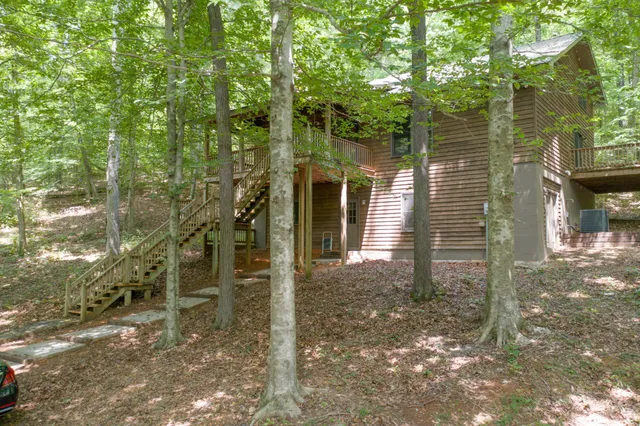 a backyard of a house with lots of green space