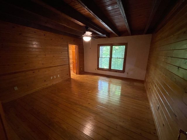 551 Shippmans Creek Road Wartrace, TN 37183 - Photo 17 of 48 a view of an empty room with wooden floor and a window