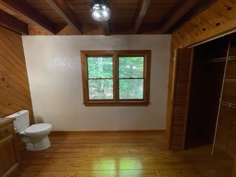 a view of a house with a cars park