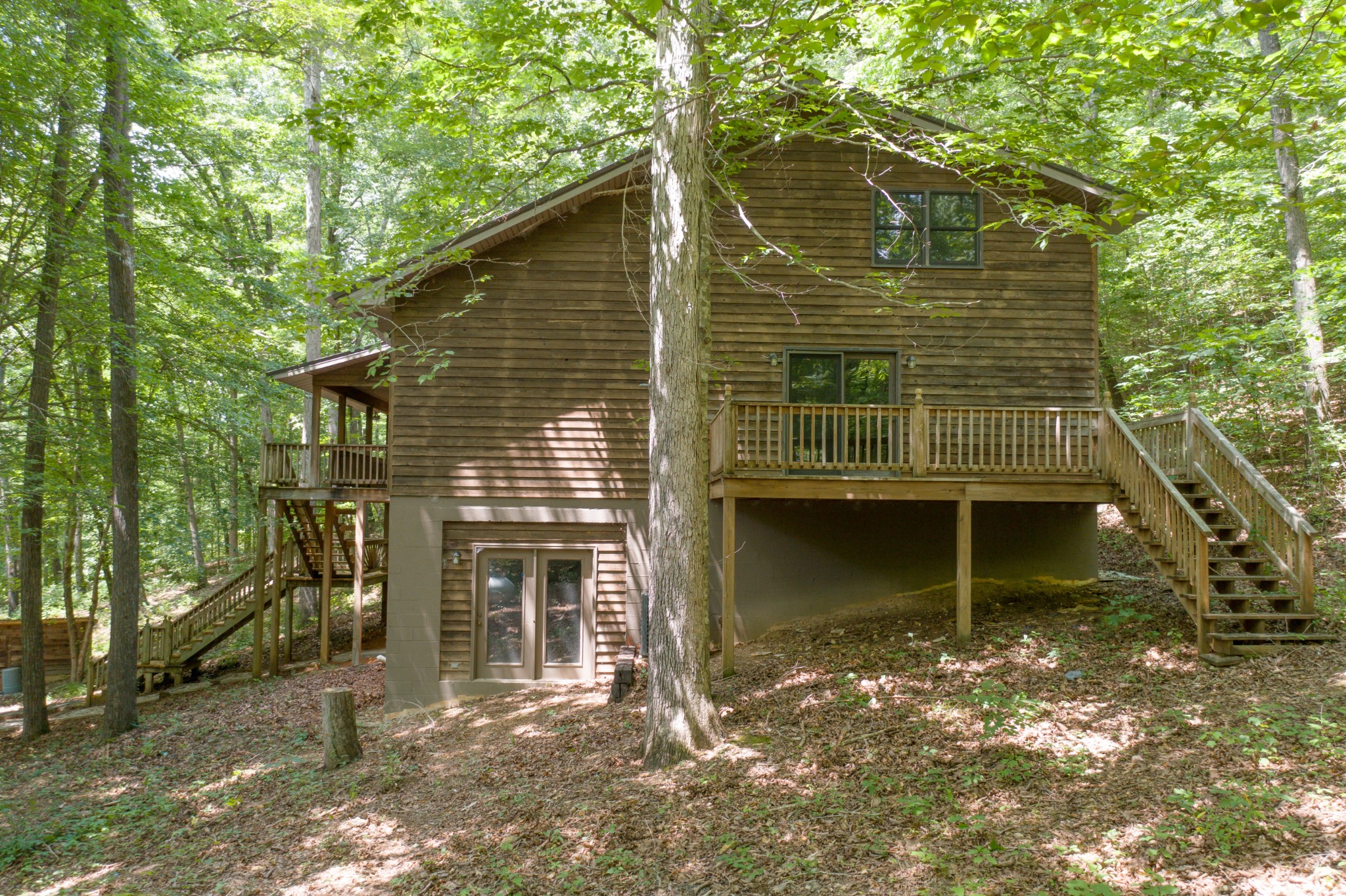 551 Shippmans Creek Road Wartrace, TN 37183 - Photo 24 of 48 a front view of a house with a garage