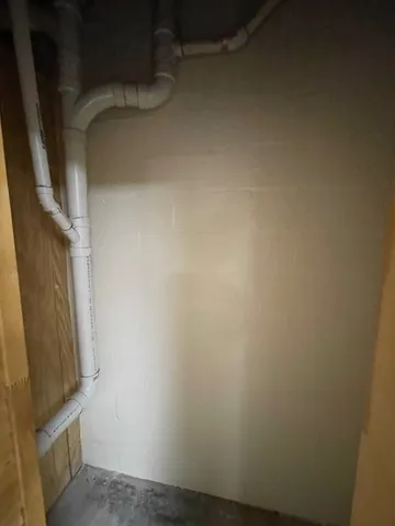 a view of backyard with deck and outdoor seating