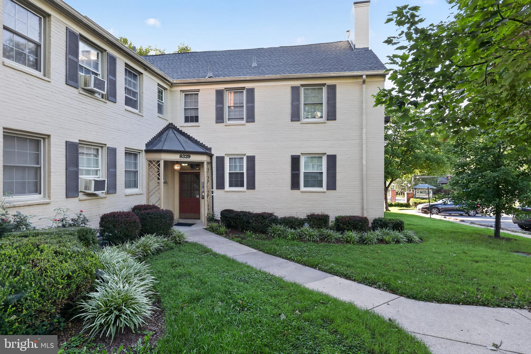 8329 Grubb Road, Unit G103 Silver Spring, MD 20910 - Photo 23 of 24 Charming residence with lush greenery.