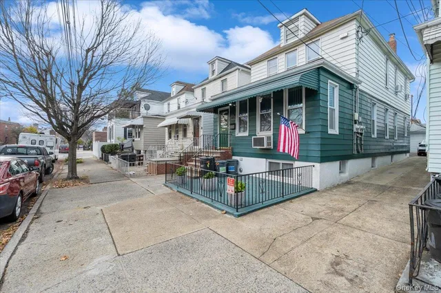 a view of a building with sitting area