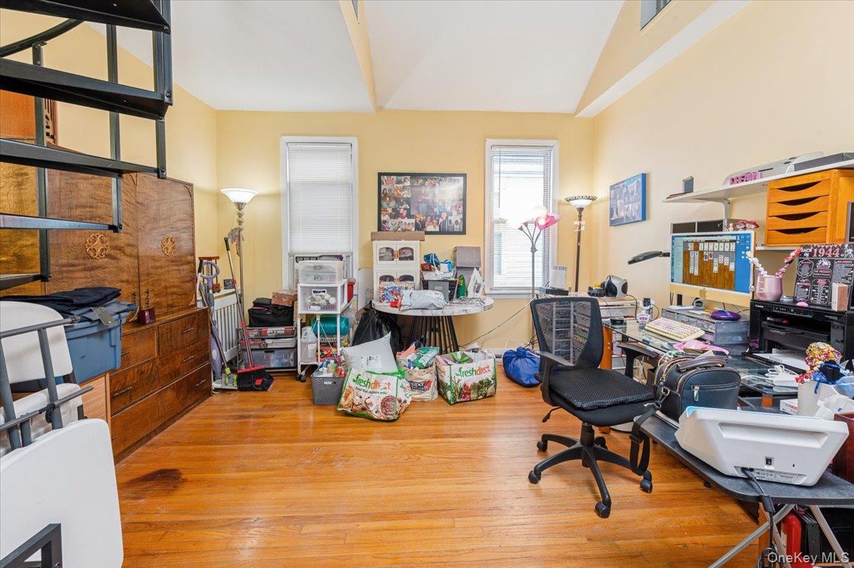 1007 Sacket Avenue Bronx, NY 10462 - Photo 25 of 29 a living room with fireplace furniture and a window