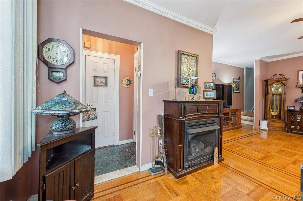 1007 Sacket Avenue Bronx, NY 10462 - Photo 8 of 29 a kitchen with stainless steel appliances granite countertop a stove and a table
