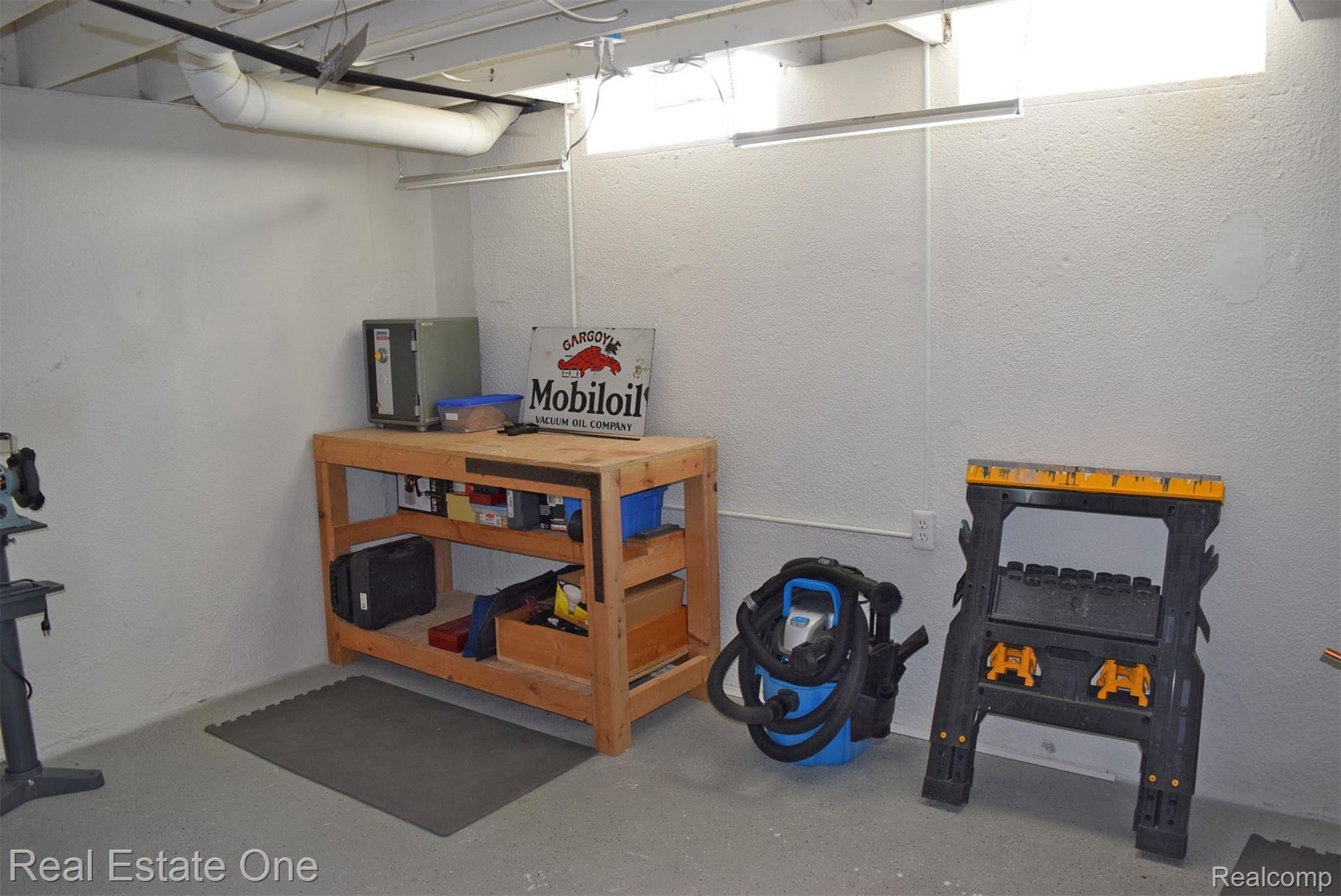 2706 Powderhorn Ridge Road Rochester, MI 48309 - Photo 36 of 48 Right now that room is being used as a workshop.