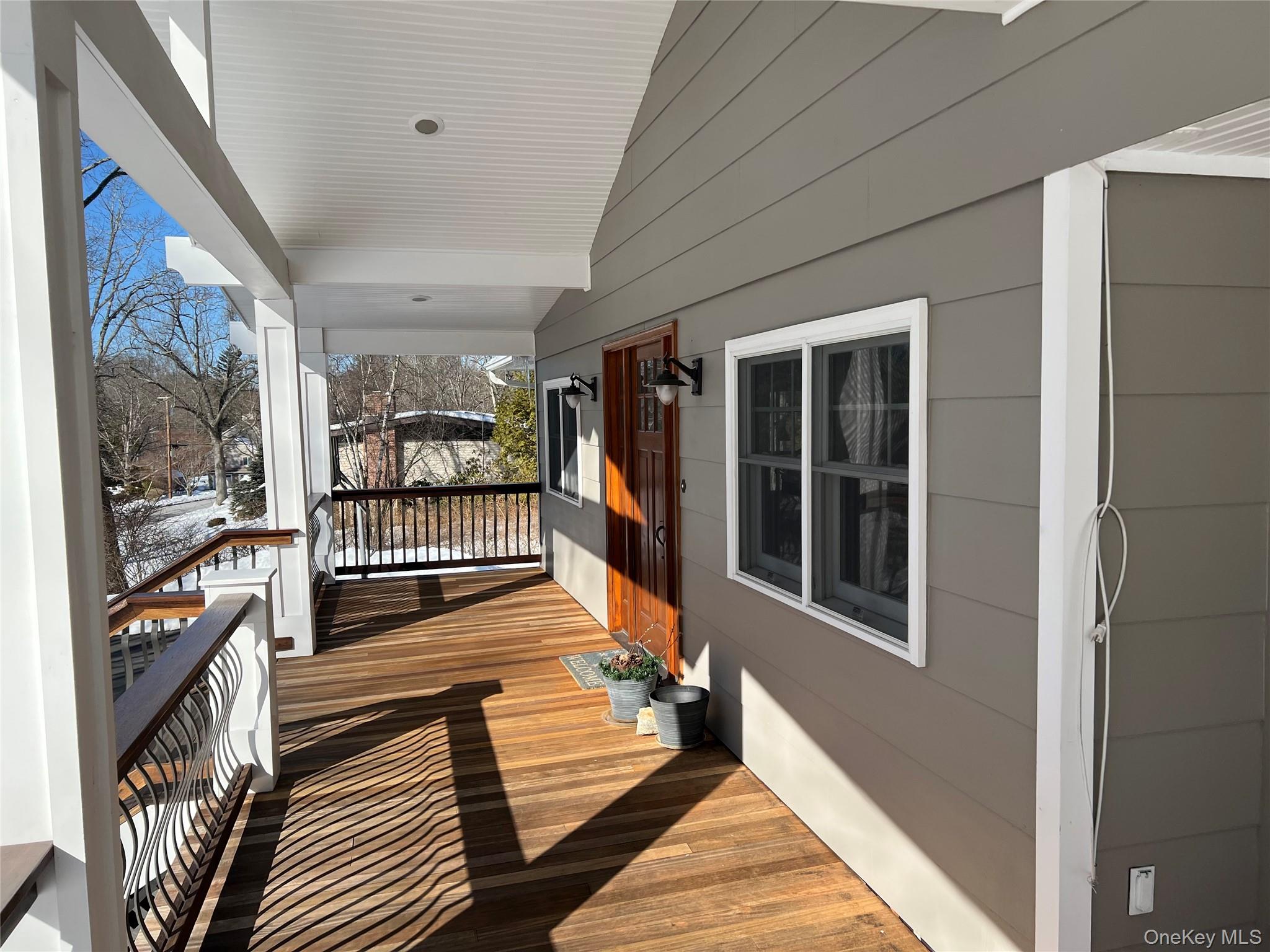 27 Lakeview Road Carmel, NY 10512 - Photo 6 of 11 a view of a balcony with wooden floor and stairs