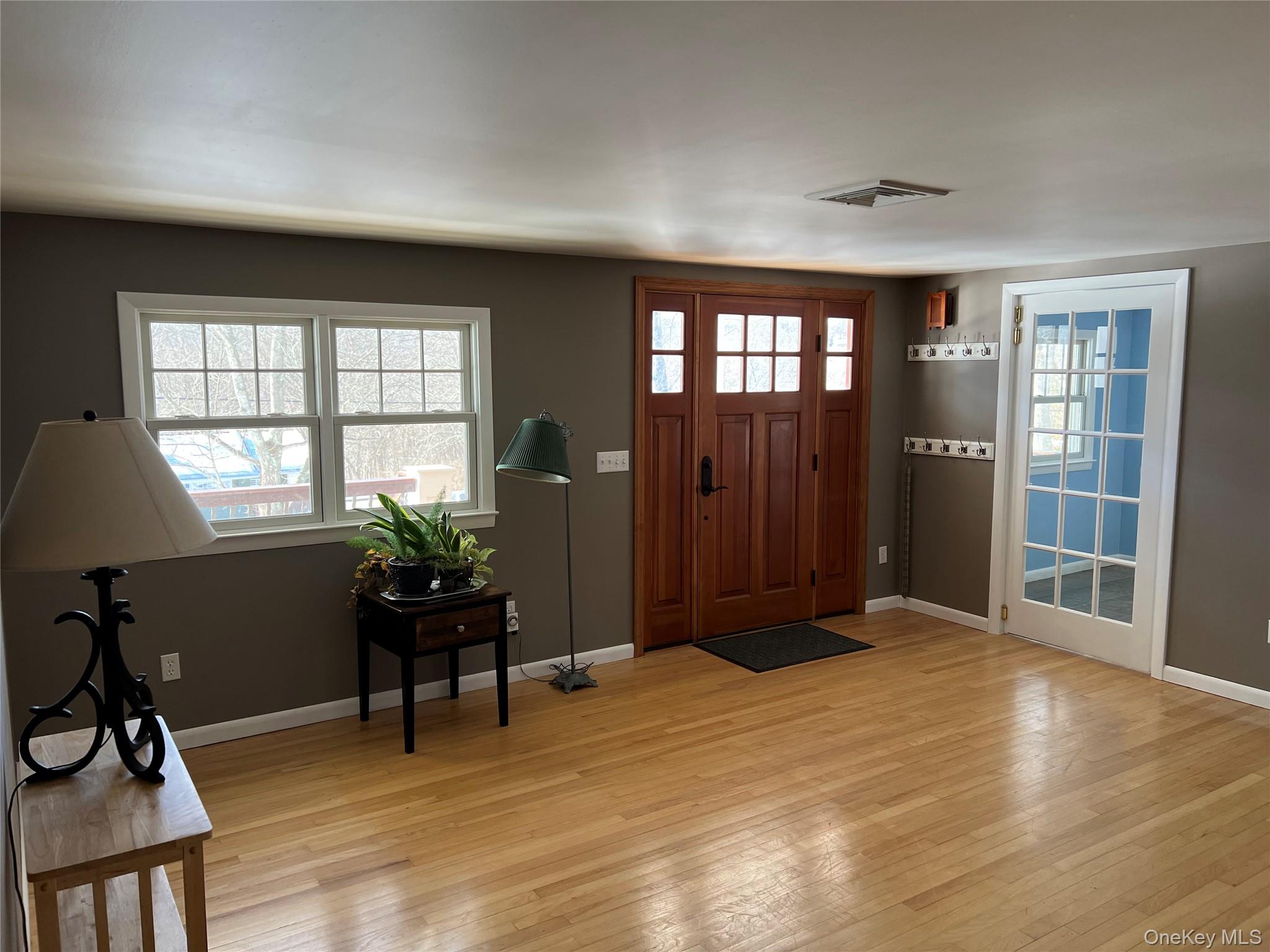 27 Lakeview Road Carmel, NY 10512 - Photo 7 of 11 a view of a livingroom with wooden floor and furniture