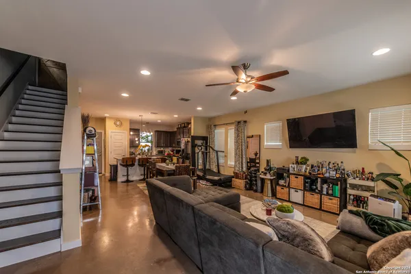 a view of a living room and entry way