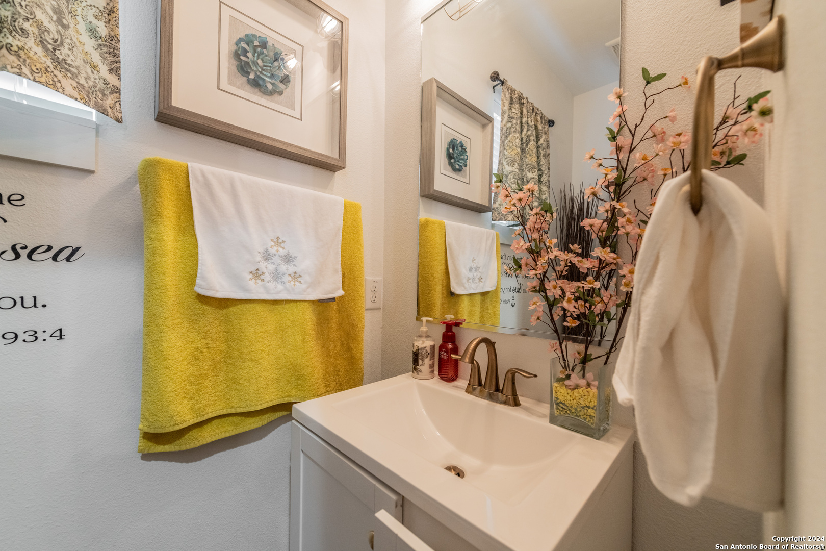 619 Burleson San Antonio, TX 78202 - Photo 10 of 21 a bathroom with a sink and a mirror