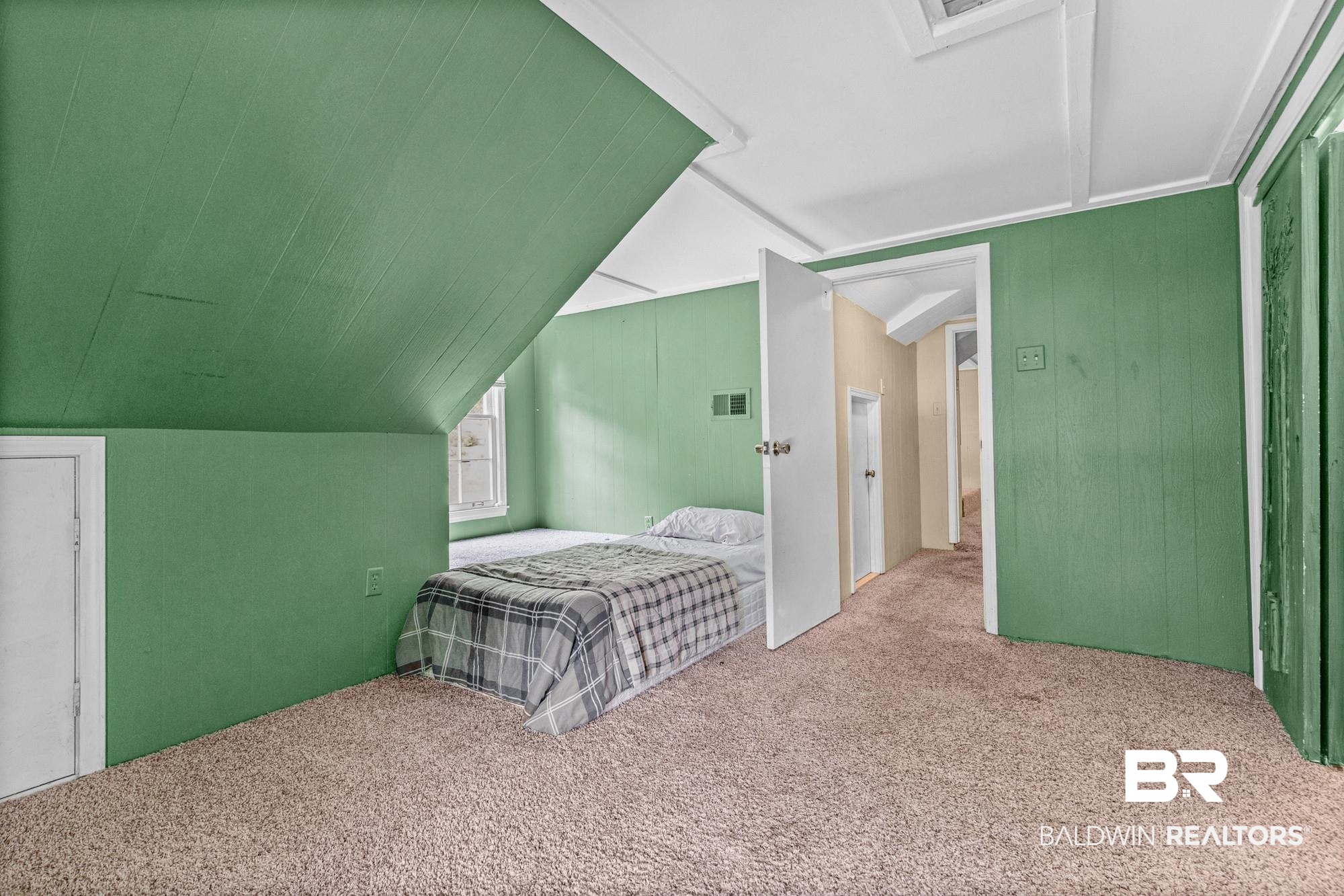 5510 Richmond Road Mobile, AL 36608 - Photo 15 of 21 Carpeted room featuring a sloped ceiling with green paneling