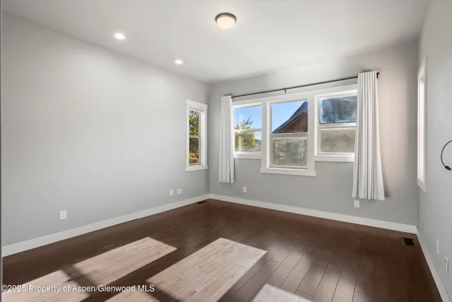 a bathroom with a double vanity sink mirror and double