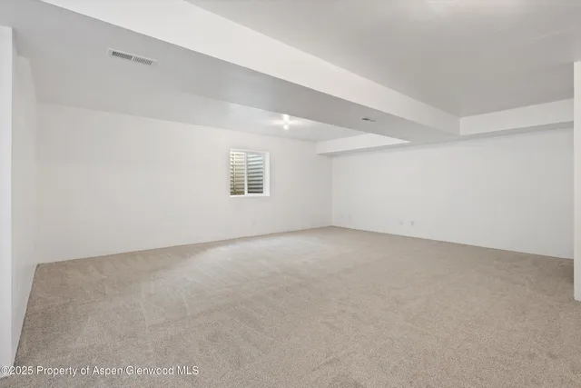 a view of a livingroom and a fireplace