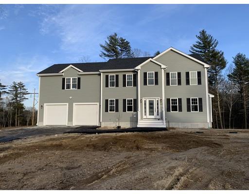 107 County Road Freetown, MA 02717 - Photo 1 of 32 a front view of a house with a yard