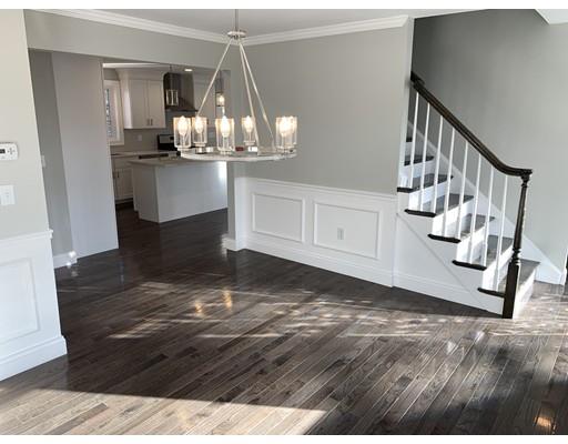 107 County Road Freetown, MA 02717 - Photo 11 of 32 a view of a livingroom with wooden floor and stairs
