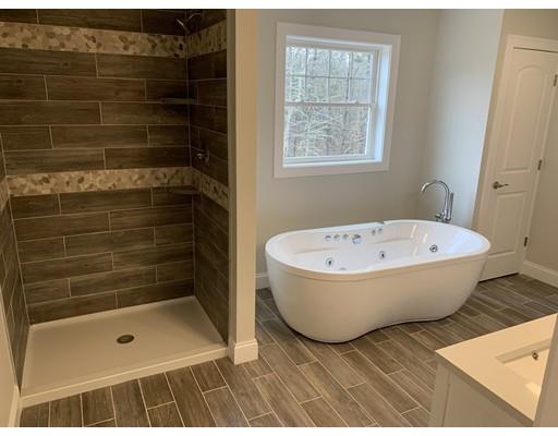 107 County Road Freetown, MA 02717 - Photo 16 of 32 a bathroom with a bathtub and shower