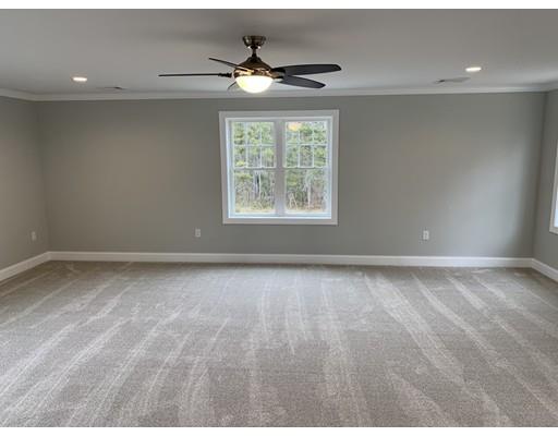 107 County Road Freetown, MA 02717 - Photo 19 of 32 a view of a livingroom with a ceiling fan and window
