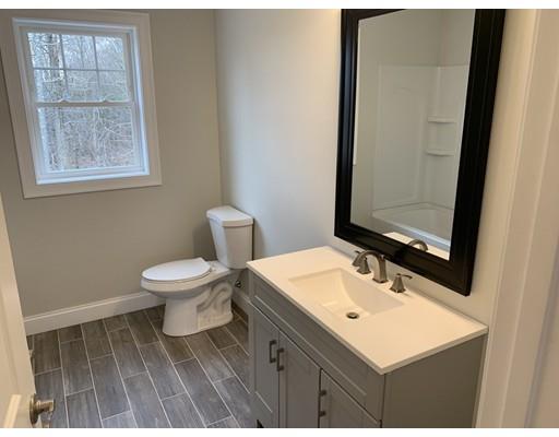 107 County Road Freetown, MA 02717 - Photo 20 of 32 a bathroom with a sink mirror and toilet