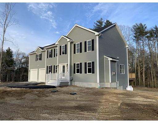 107 County Road Freetown, MA 02717 - Photo 2 of 32 a front view of a house with a yard