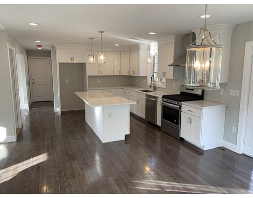 107 County Road Freetown, MA 02717 - Photo 5 of 32 a kitchen with stainless steel appliances kitchen island a sink and a stove