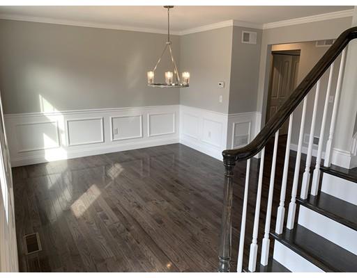 107 County Road Freetown, MA 02717 - Photo 10 of 32 a view of a livingroom with wooden floor and stairs