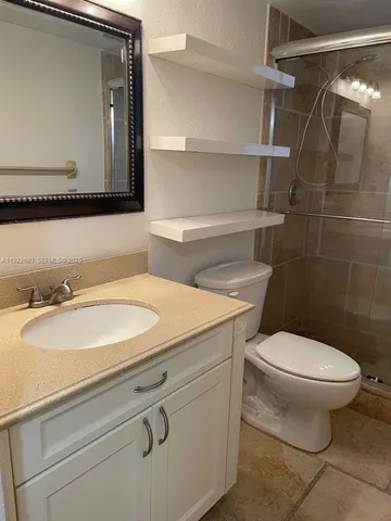 a view of a yard from a balcony